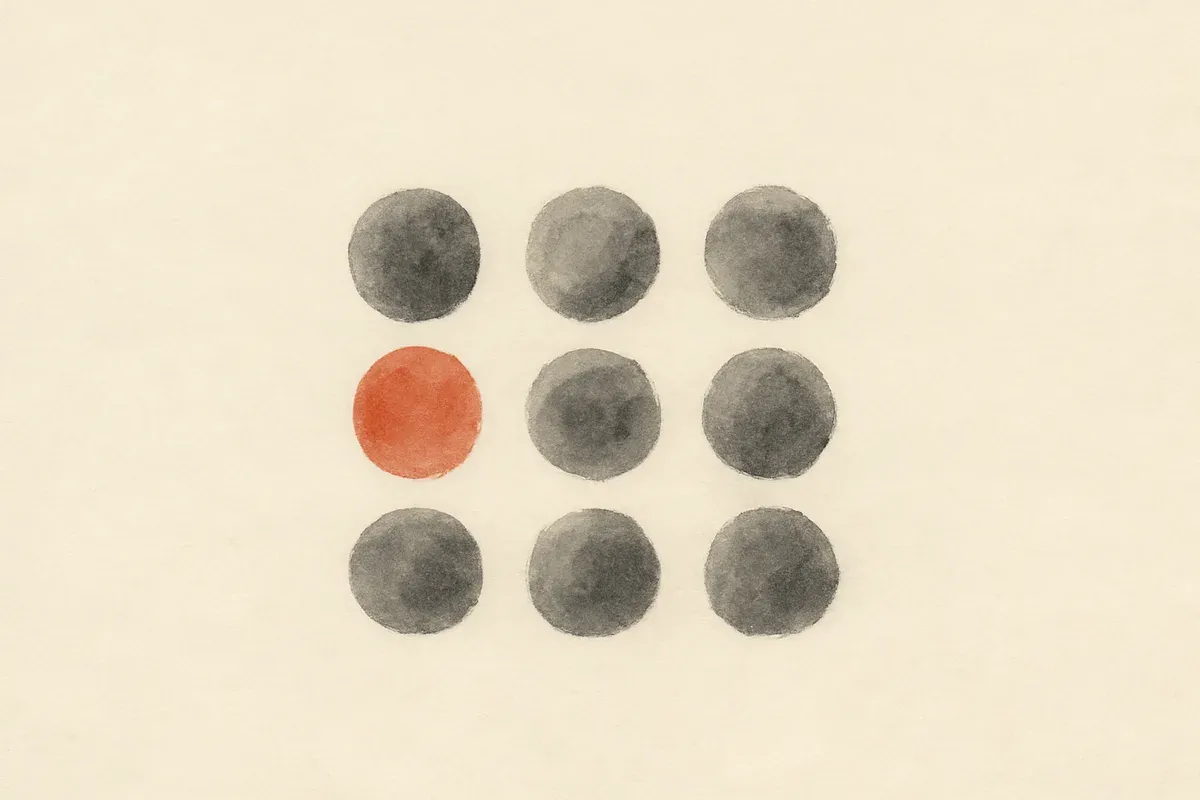 Ink wash illustration of eight round ink tokens in a grid, one washed in terracotta.